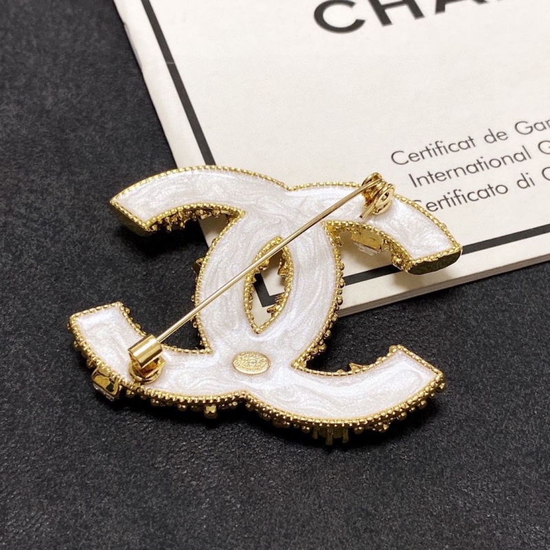 Ch**el brooches